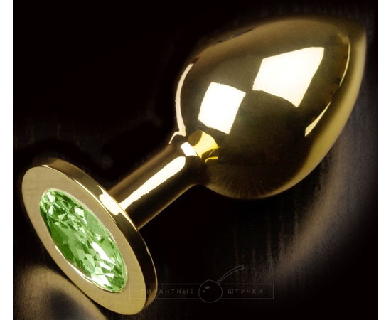 Золотистая анальная пробка с салатовым кристаллом - 9 см., фото 