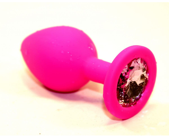 Розовая силиконовая анальная пробка с розовым стразом - 7 см., фото 