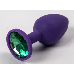 Фиолетовая силиконовая анальная пробка с зеленым стразом - 7,1 см., фото 